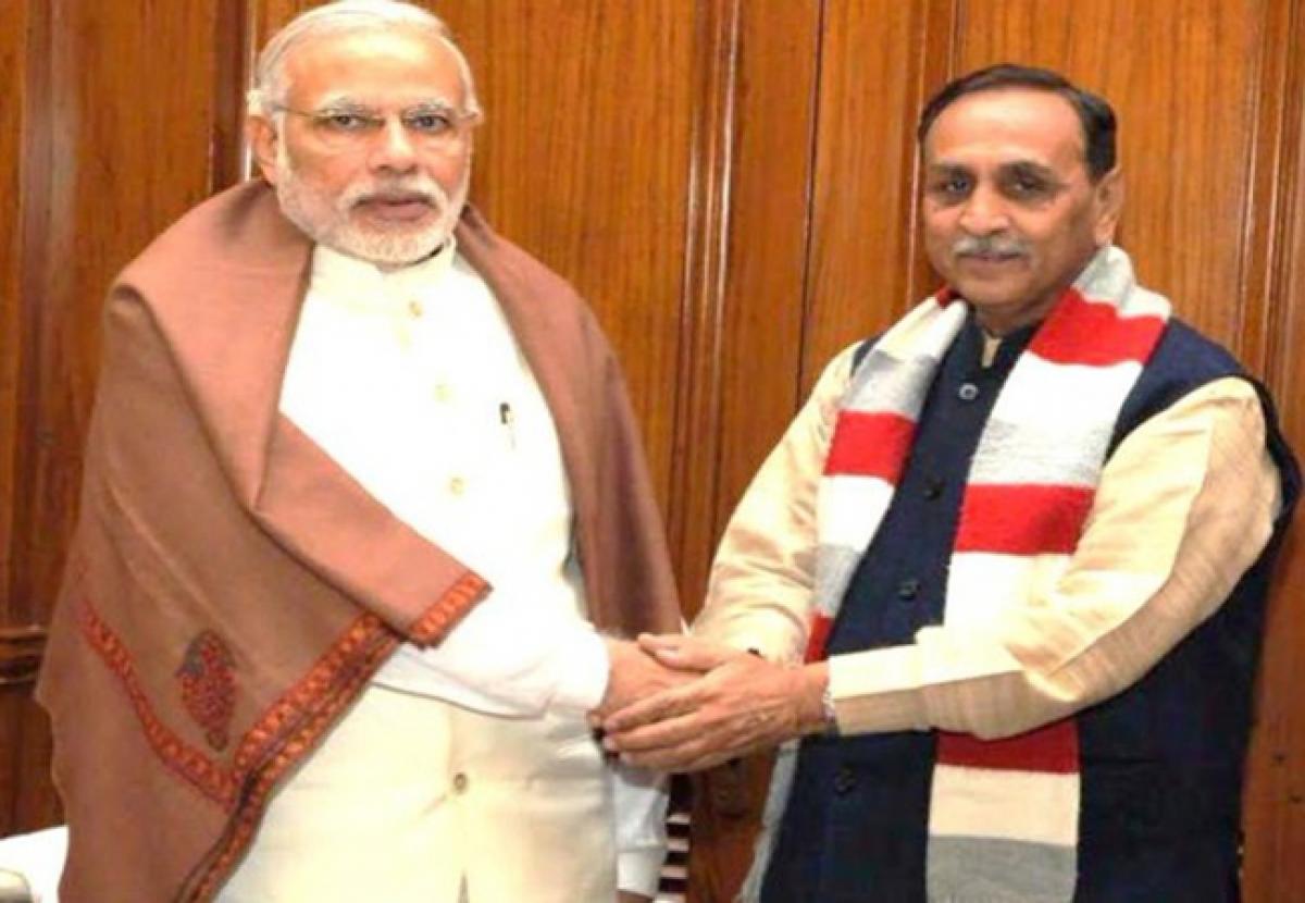 Modi congratulates Rupani as new Gujarat CM